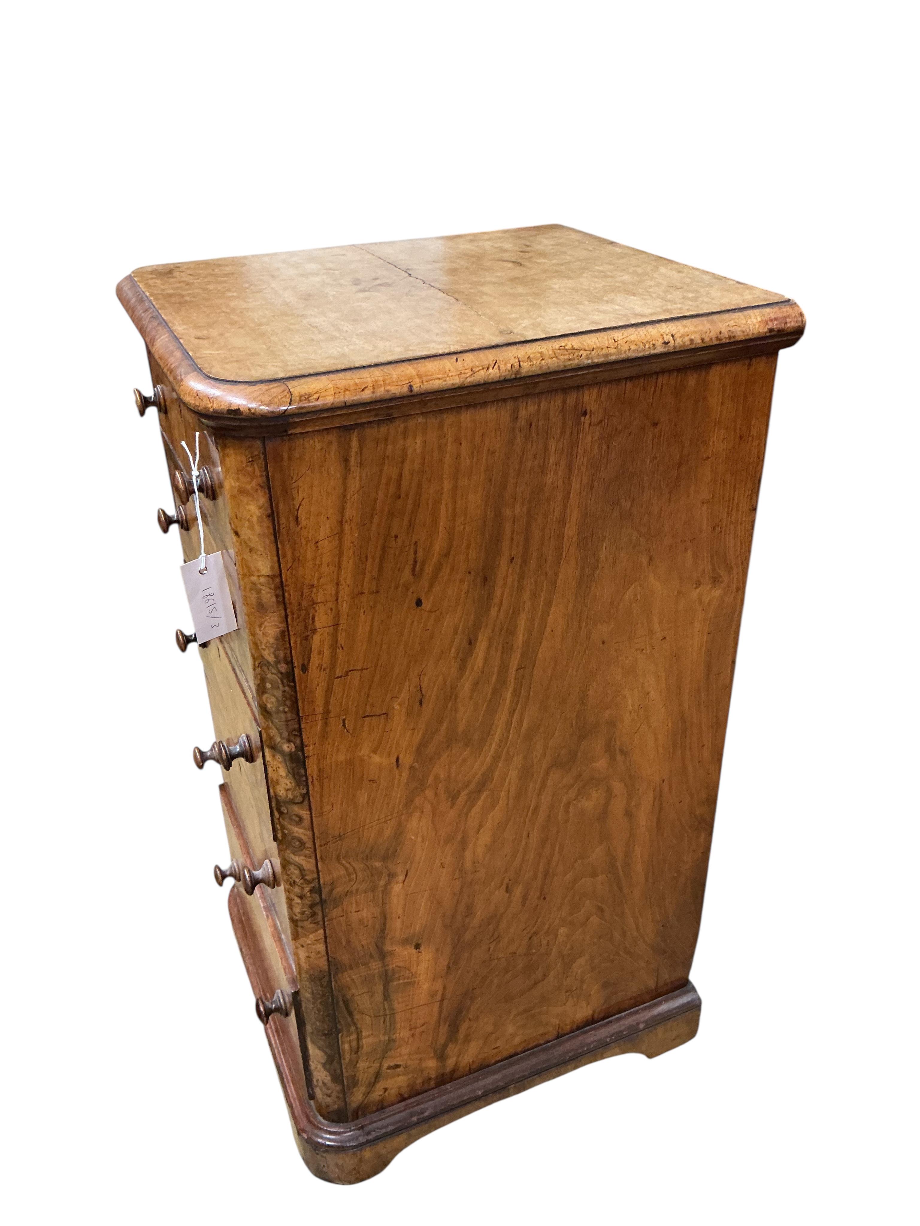 A pair of Victorian figured walnut five drawer bedside chests, adapted from a dressing table, width 43cm, depth 47cm, height 86cm
